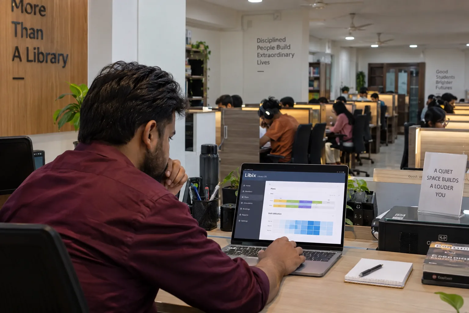 Study library manager reviewing membership plans and shift capacity for revenue analysis